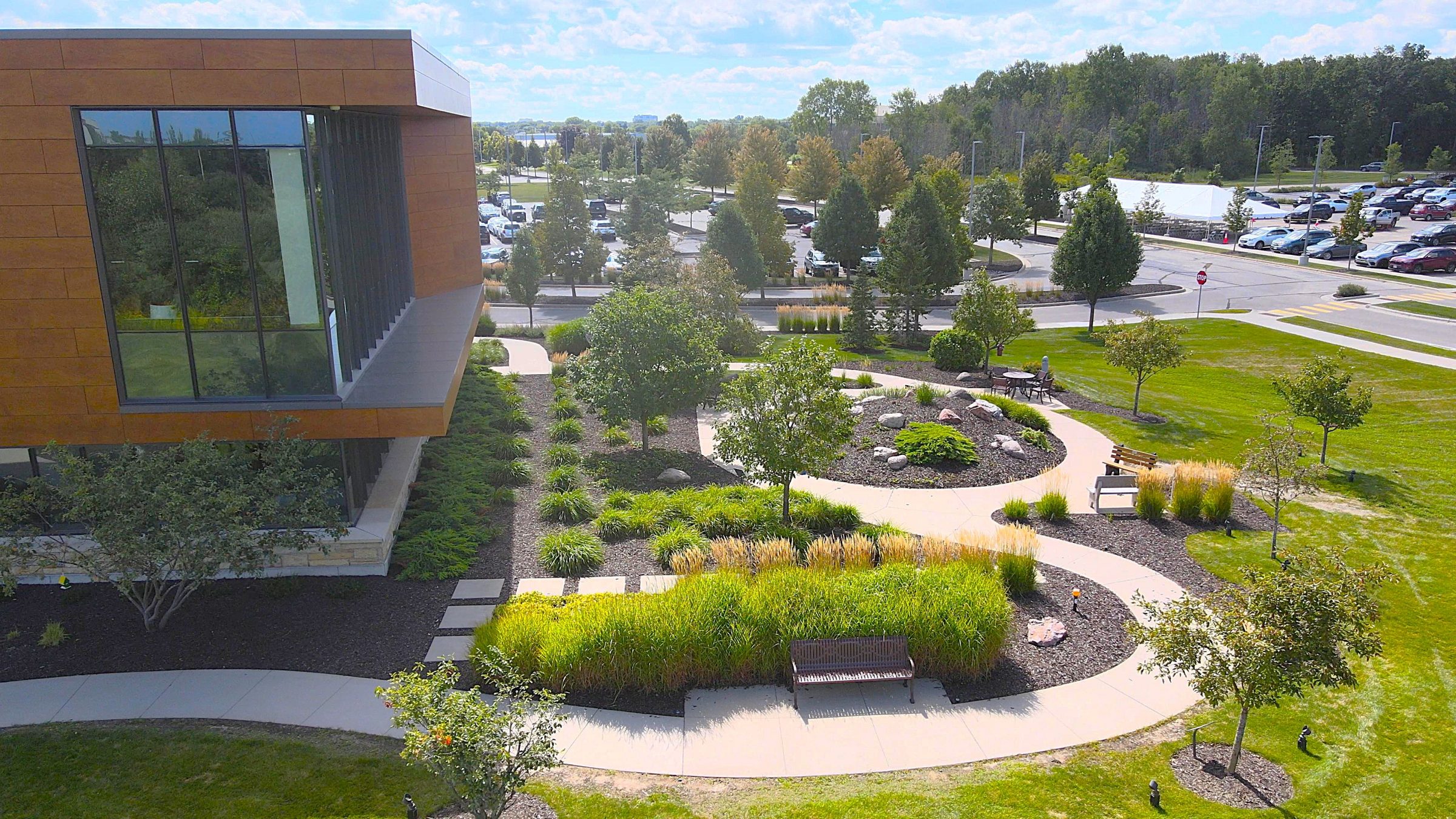 Modern office building with landscaped garden and walkway