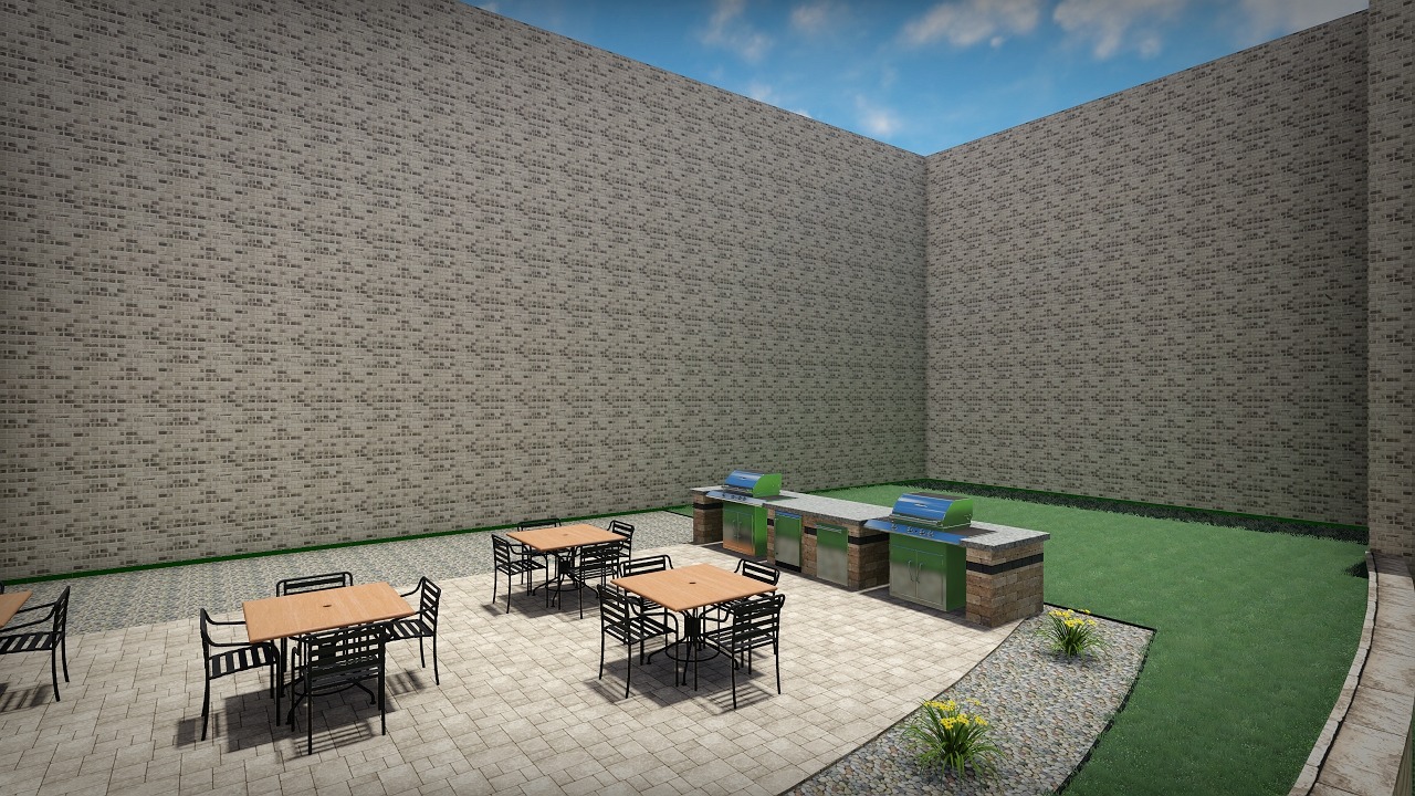 Outdoor courtyard with tables and built-in grills