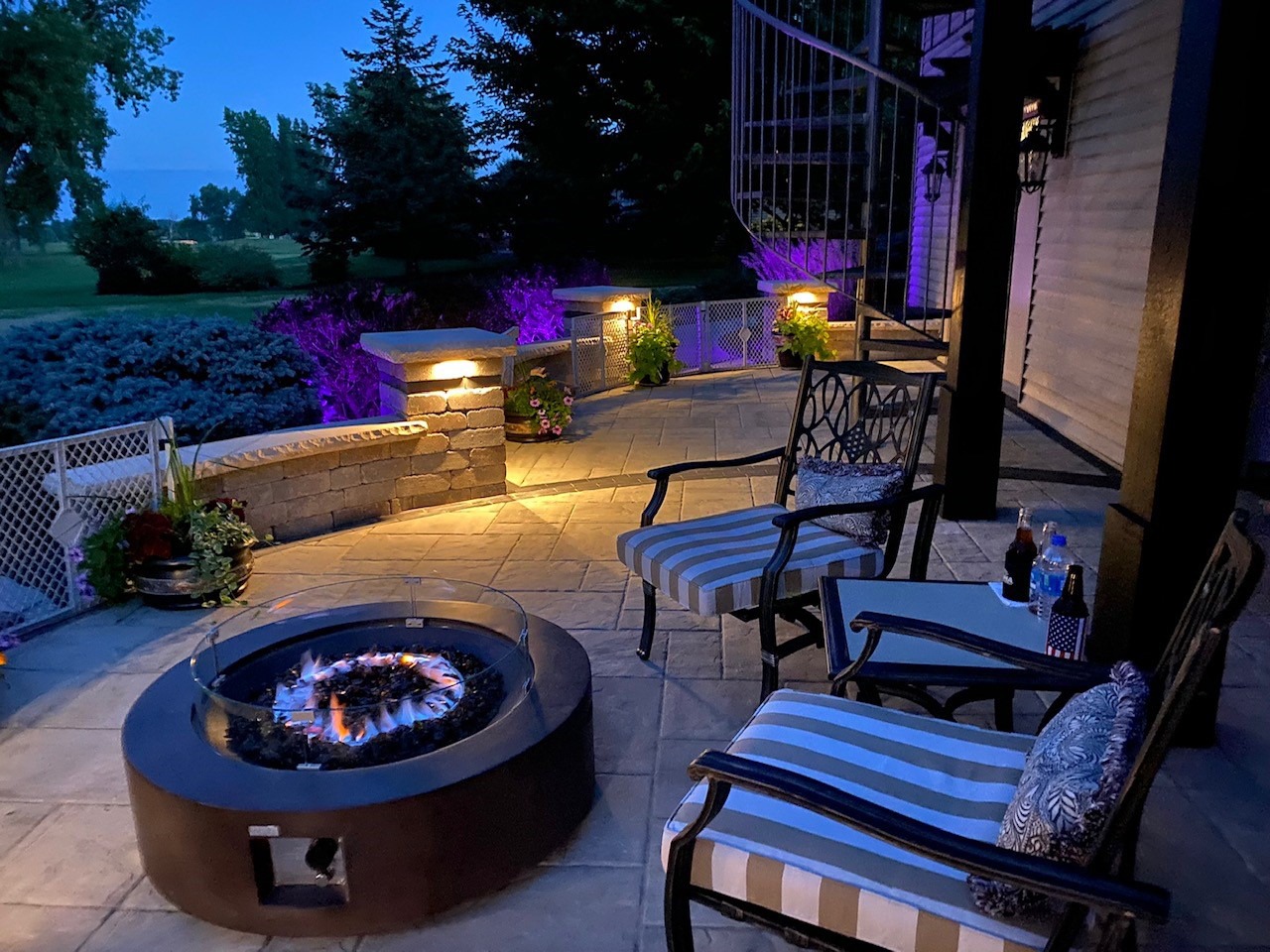 Cozy patio with fire pit at dusk