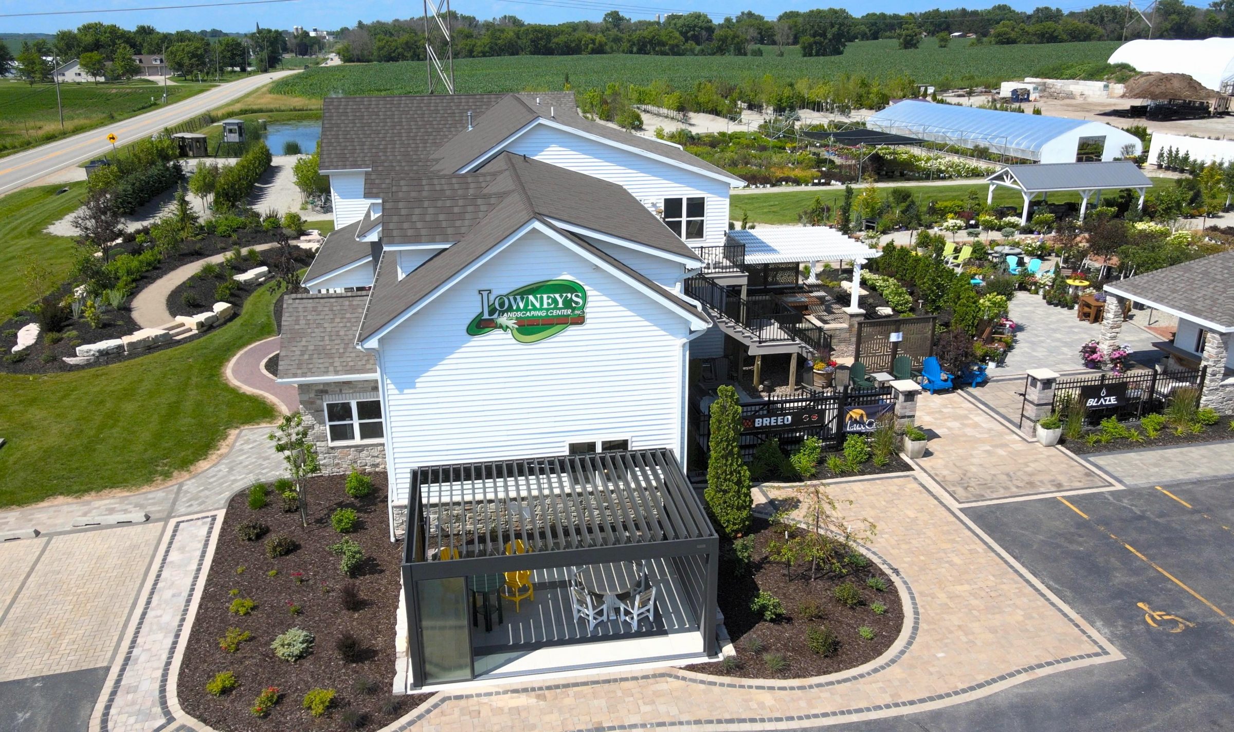 Aerial view of landscaping center with gardens and patios