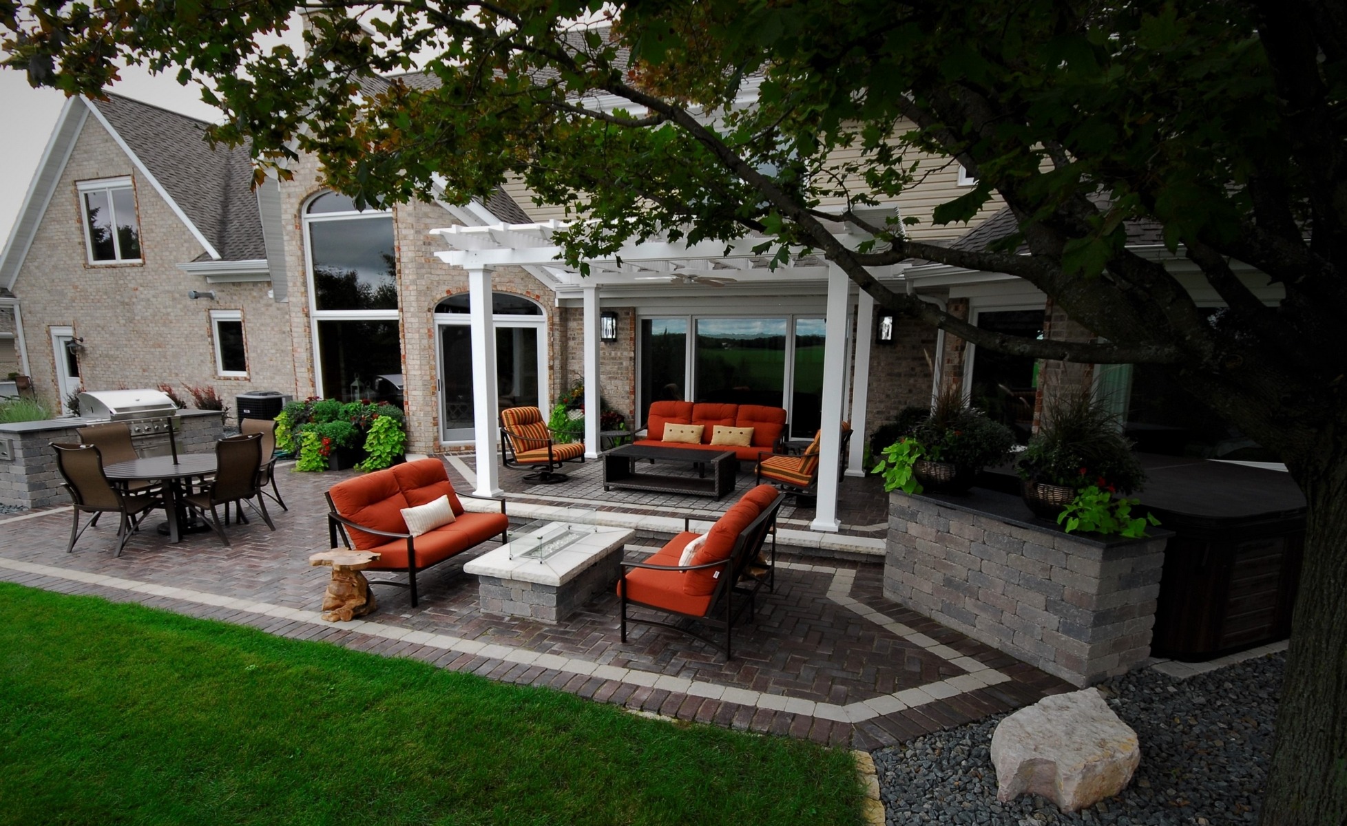 Backyard patio with pergola and outdoor seating