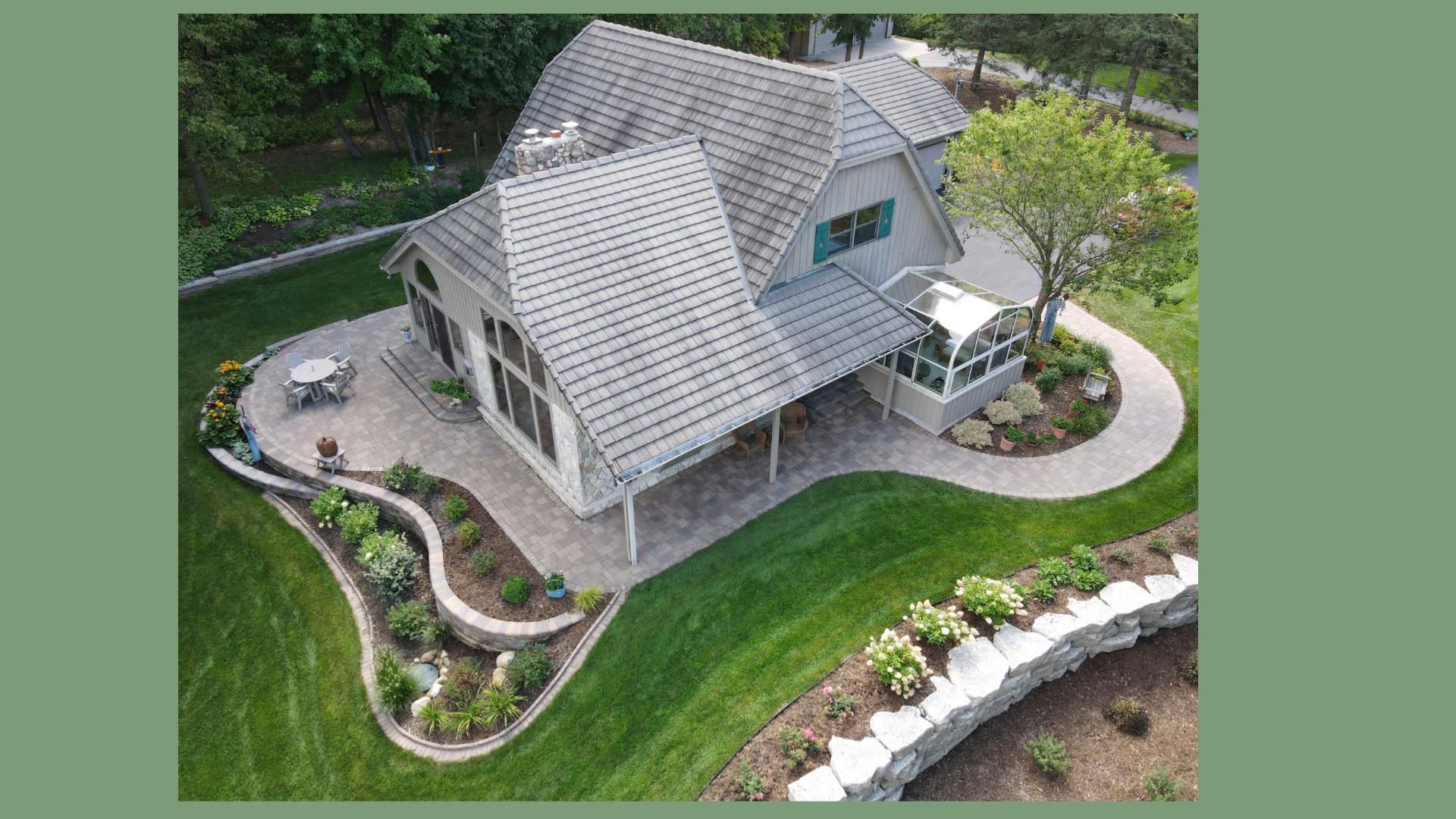 Aerial view of landscaped backyard and patio