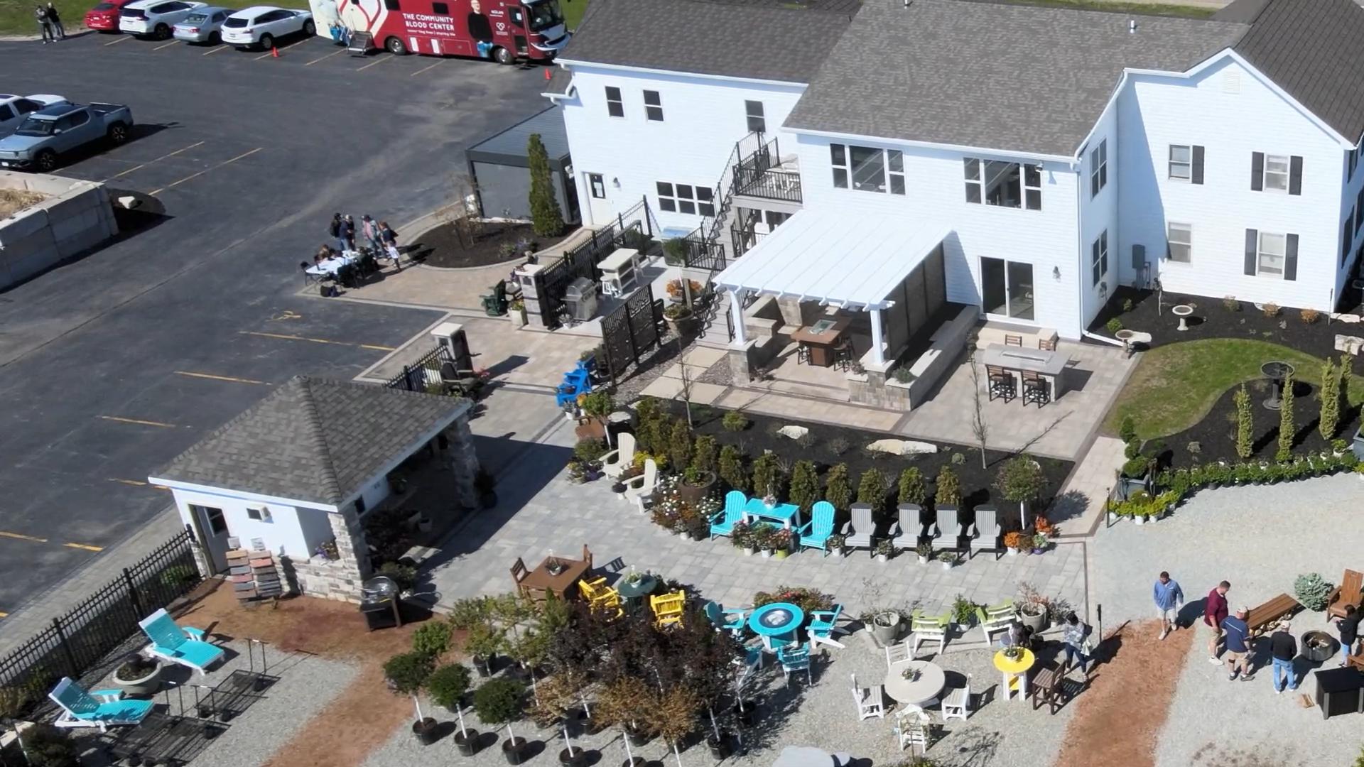 Aerial view of landscaped patio and outdoor showroom