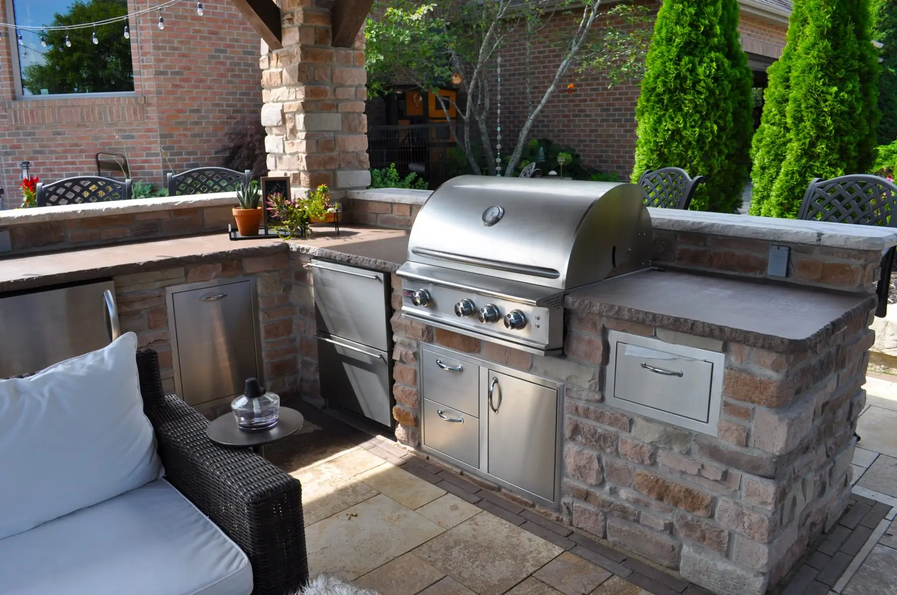 Outdoor brick kitchen with stainless steel grill